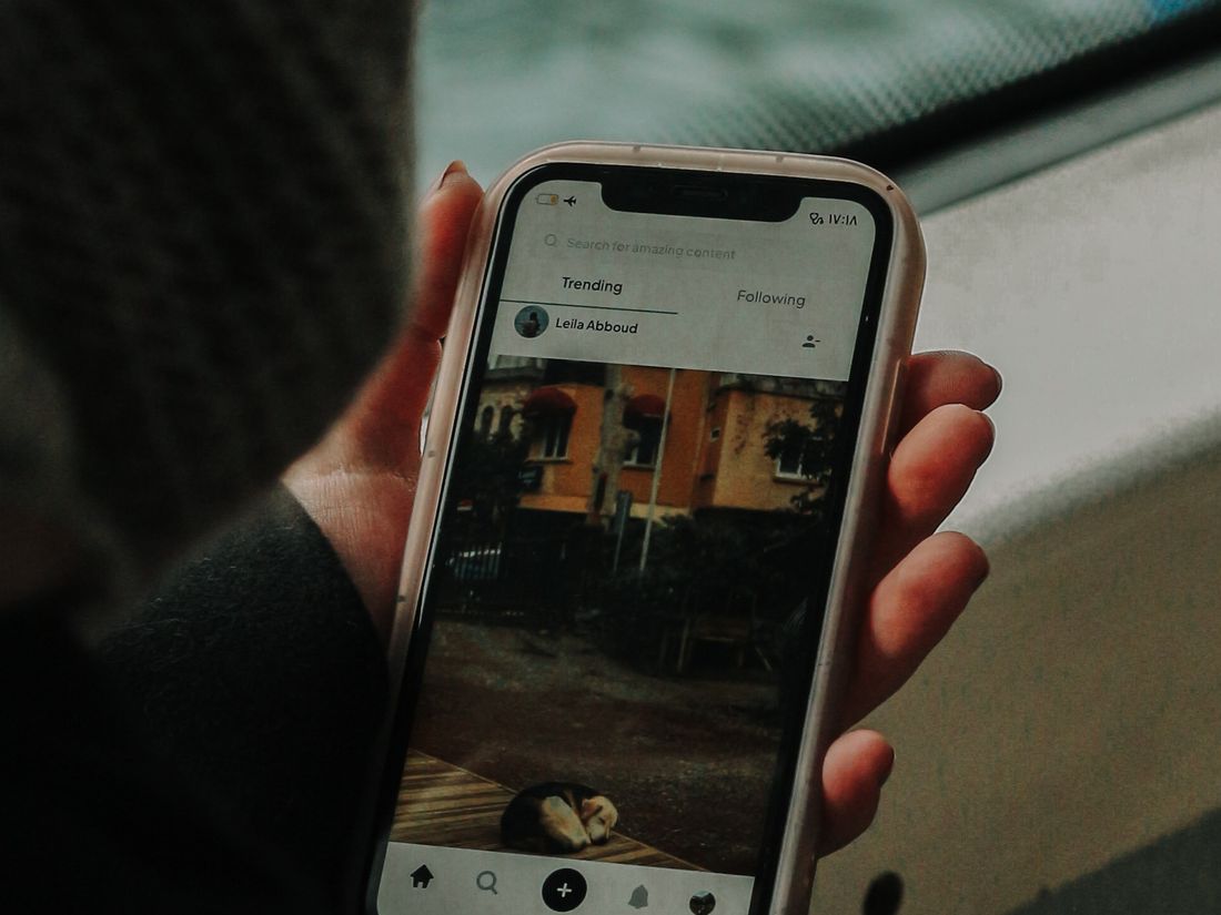 A smartphone showing a WhatsApp Business conversation where a patient asks about an appointment, receives a fast professional reply, and sees a booking confirmation, framed in ClinicsRise navy and teal with a green WhatsApp accent
