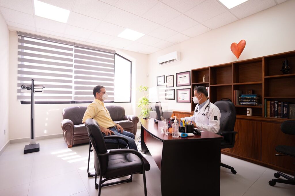 A doctor meeting a patient in a bright clinic office